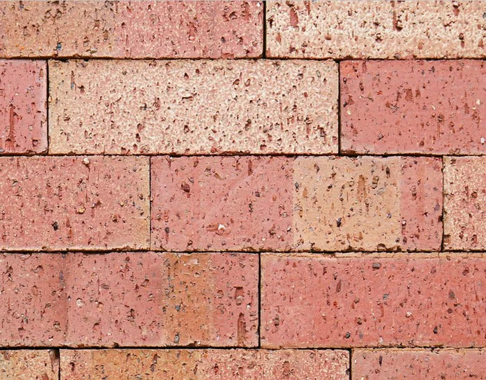 Pattern of red and beige bricks