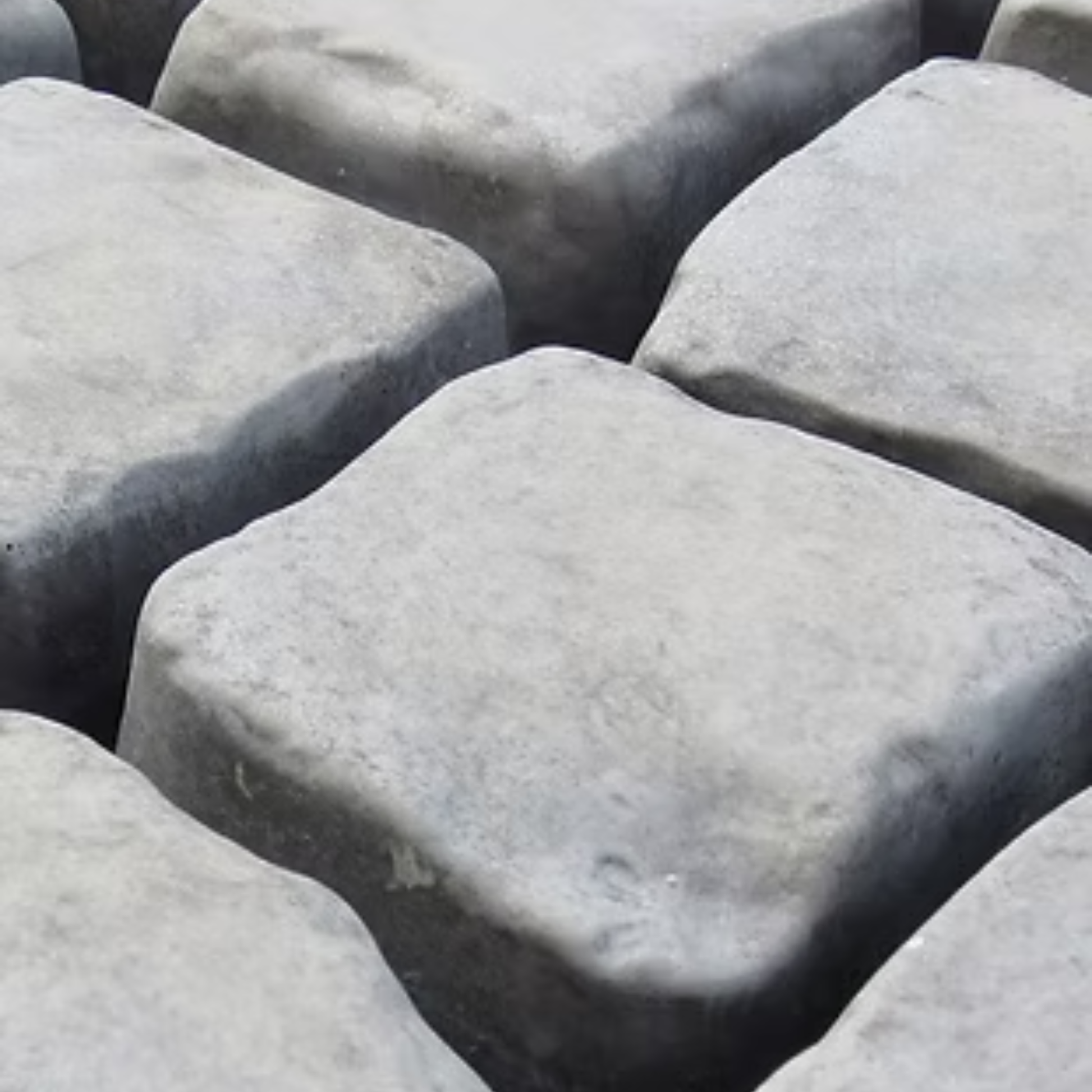 Close-up of gray stone blocks arranged in a pattern