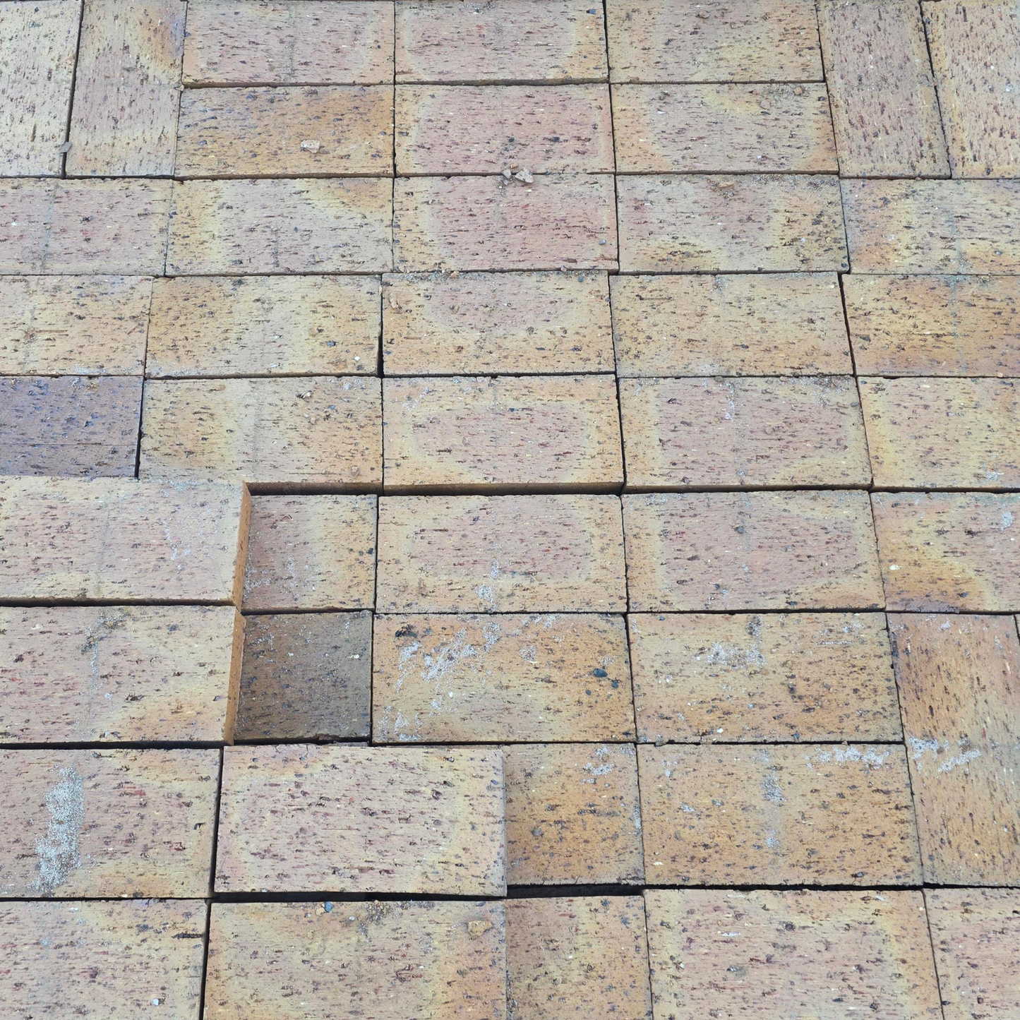 Patterned stone tiles arranged in a grid